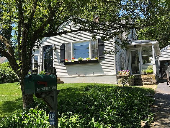 side porch and 2 car garage