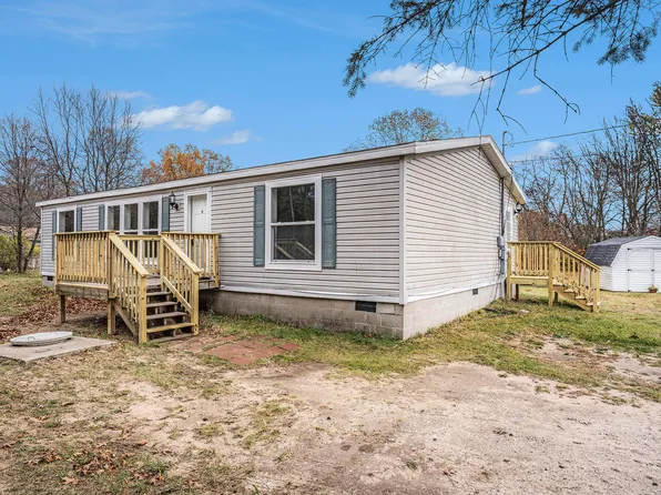 7034 S Surf Ct, Rothbury, MI 49452