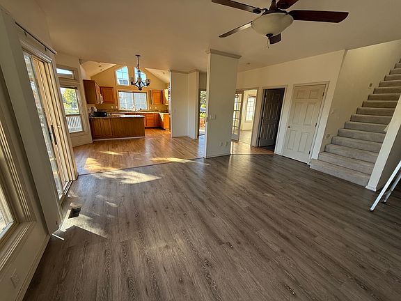 Living Room thru to dining and kitchen and front entrance and office