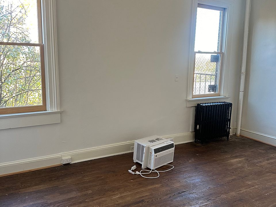 Bedroom view #1 overlooks the building's back yard.