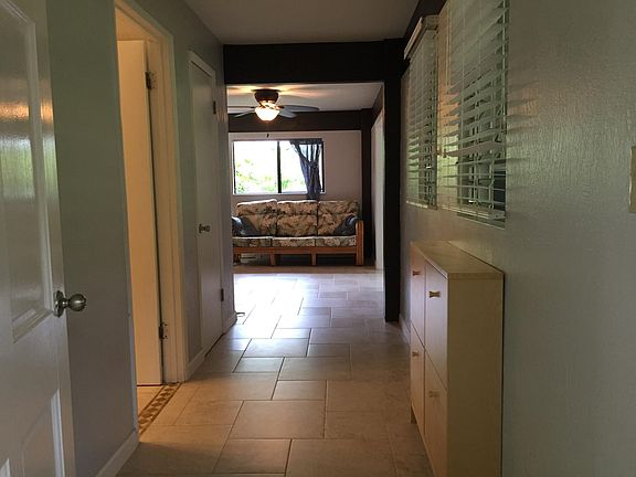 Entering from front door, 1st door on left bathroom, 2nd door on left walk in storage closet, main living space straight ahead, kitchen to left of couch, bedroom to right of couch