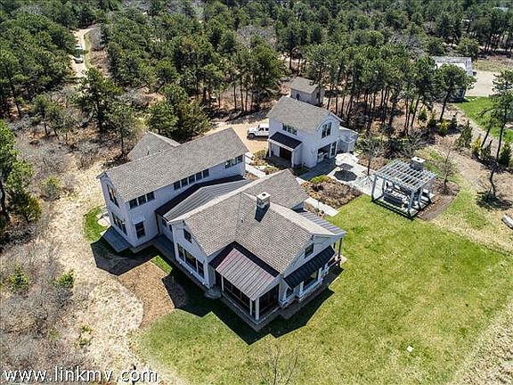 Main house, garage guest bedroom, storage shed and patio