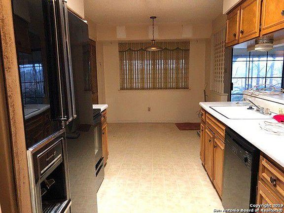 Kitchen looking at back of home