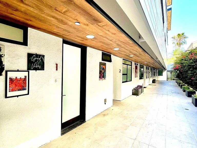 Walkway, covered unit entrance