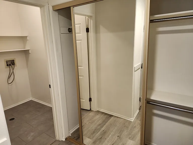 Hallway closet with view of Laundry Room for your washer and dryer!