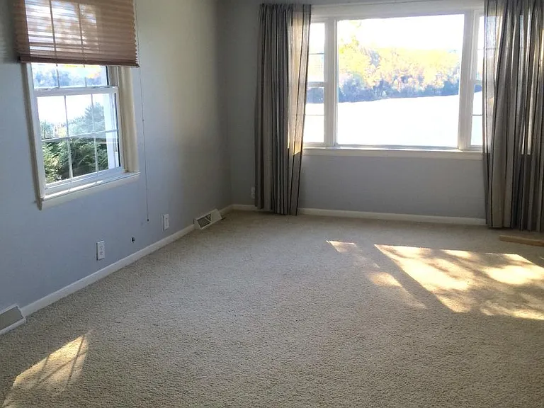 Large picture window overlooks beautiful Muskegon river