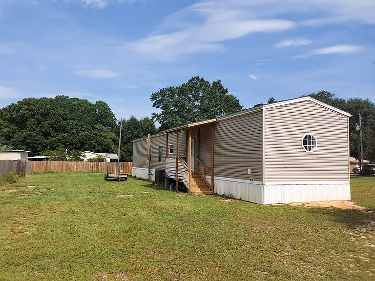 There's plenty of space in the 37' x 115' back yard for your dog to run or your camper and boat to be hidden from the street.