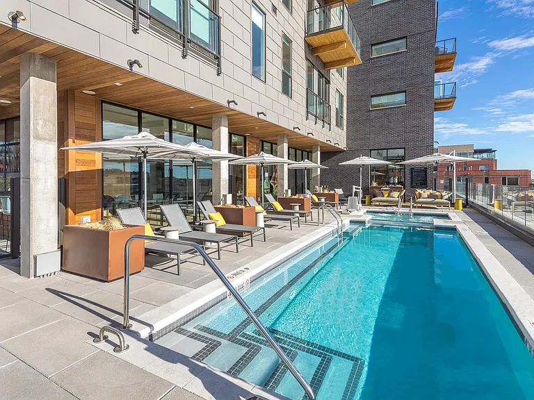 Swimming pool with sundeck, chaise lounges, gorgeous views.