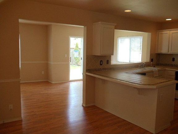 Open kitchen with custom tile work