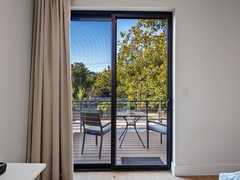 Balcony access from the bedroom.