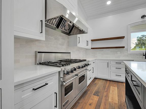 4th image of 9835 Woodland Hills Way