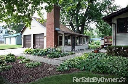 2 car detached garage and enclosed porch
						:
						2 car detached garage with enclosed porch and fireplace.