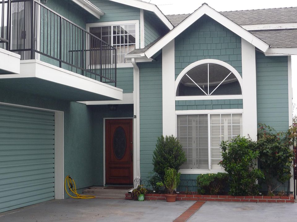 Front- Main entrance with 2 car Garage & balcony attached to master bedroom