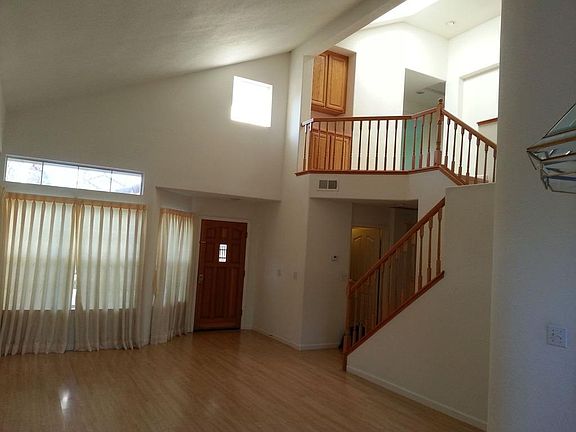 Formal Living Room with Natual Skylightling from Upstairs