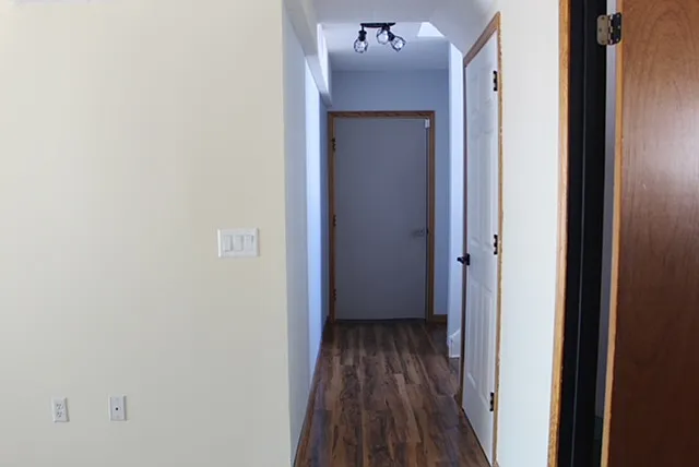 Downstairs hallway, looking at the garage door.