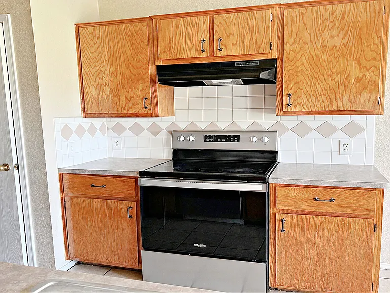 Stove & pantry in kitchen