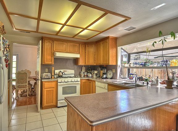 Remodeled kitchen with corian counters