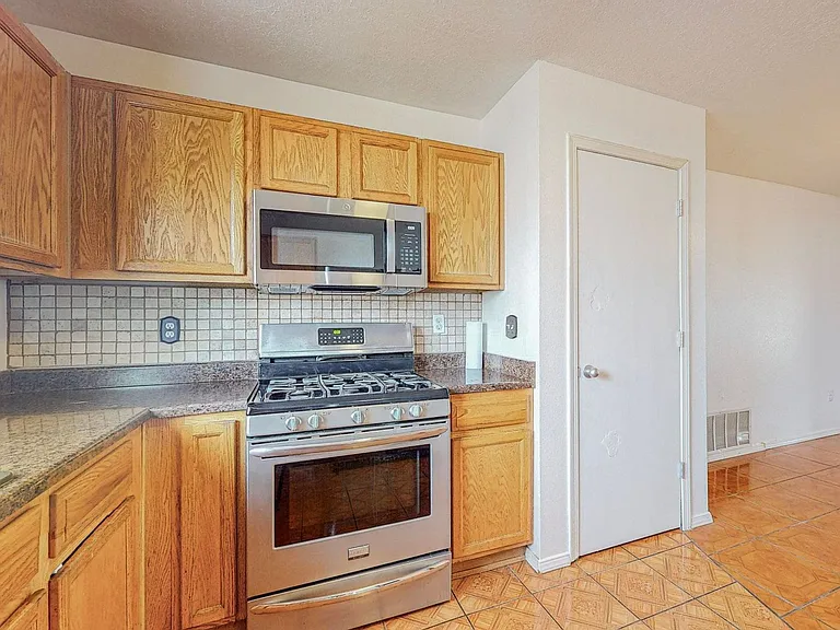 9114 Schooner Rd NW — Photo 13