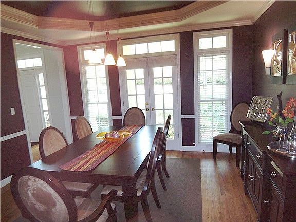 Dining room with trey ceiling and french doors
