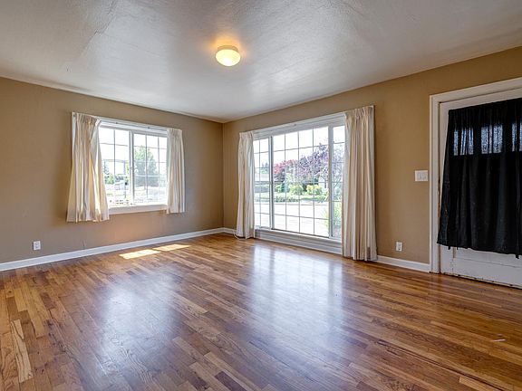 Hardwood floors makes for a warm and classic feel.