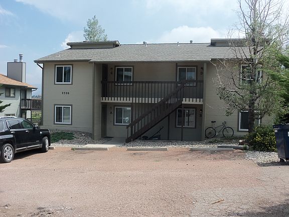 Back View of 4-Plex w/1 designated parking