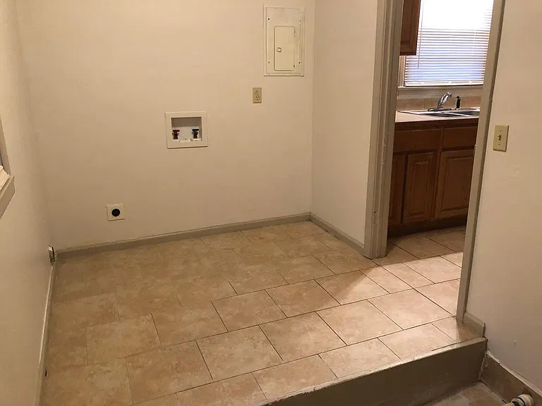 Laundry area off of kitchen