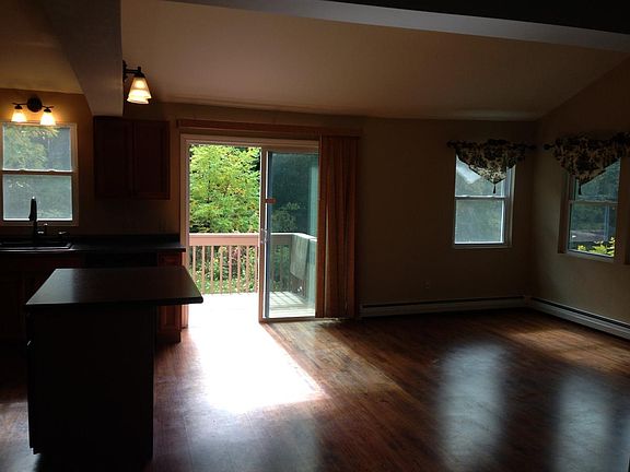 Slider off kitchen to private deck over looking large back y