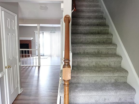 Naturally Lit Entryway and stairs