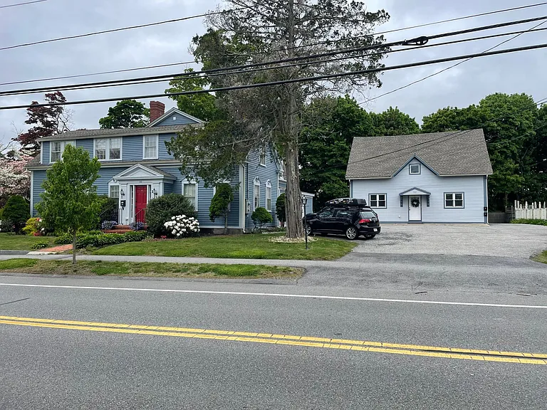 Street view of main house and carriage house