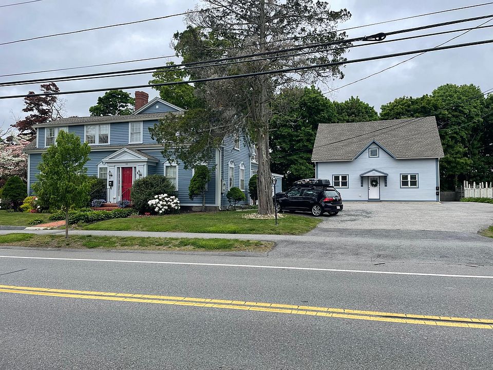 Street view of main house and carriage house