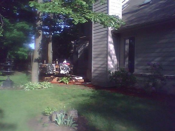 LARGE FENCED IN BACKYARD
