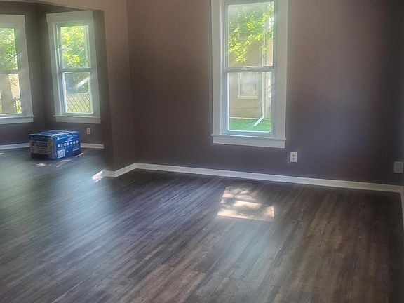 Living room opens to dining area