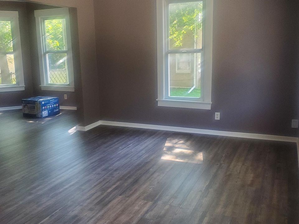 Living room opens to dining area