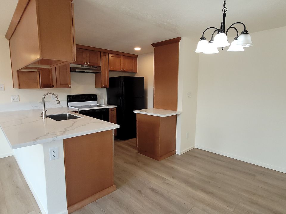 kitchen includes a pantry and many cabinets