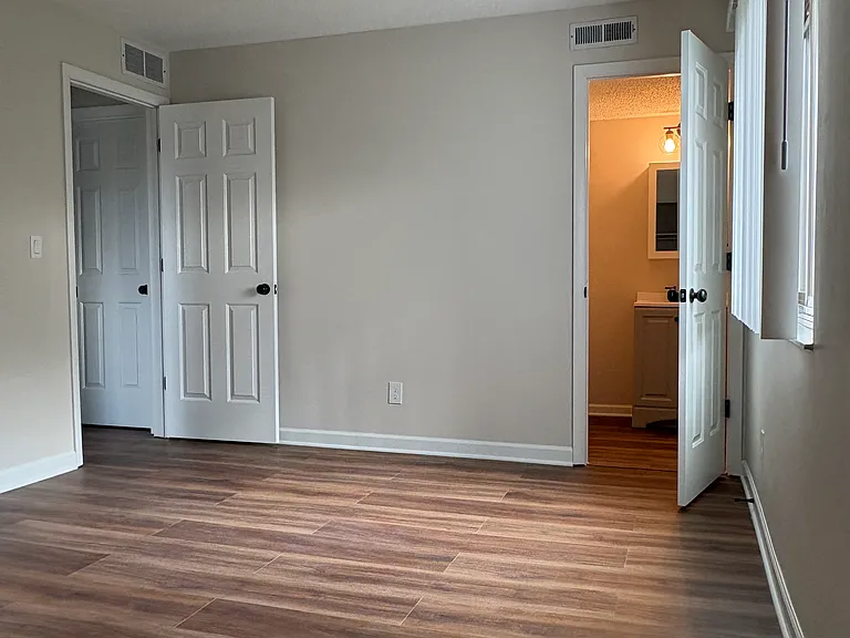 Master bedroom with half bath