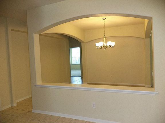 Entry to home and view of dinning room.