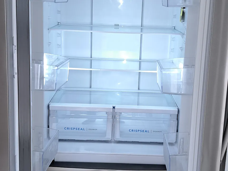 INSIDE OF NEW FRENCH DOOR REFRIGERATOR.