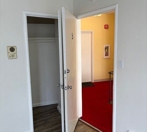 View of front door from inside apartment