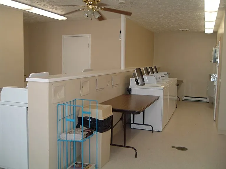 410 - WINDING BROOK APARTMENTS — Photo 3