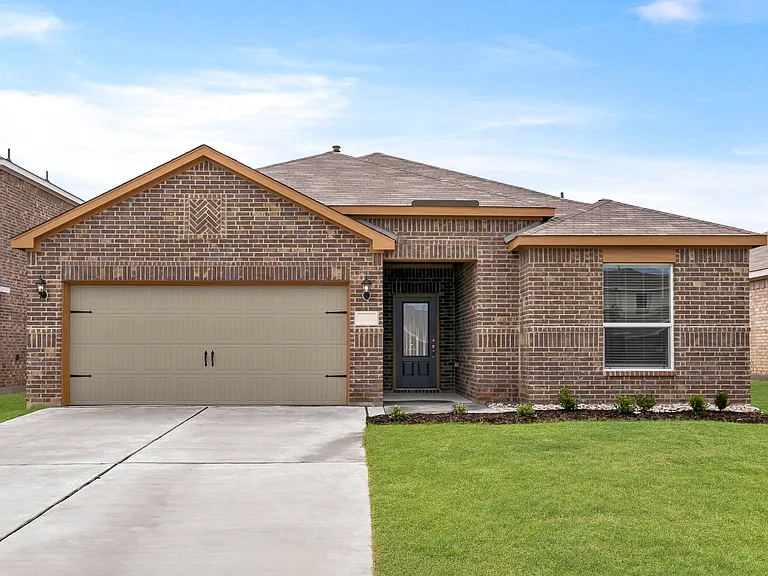 The Reed is a beautiful one-story brick home.