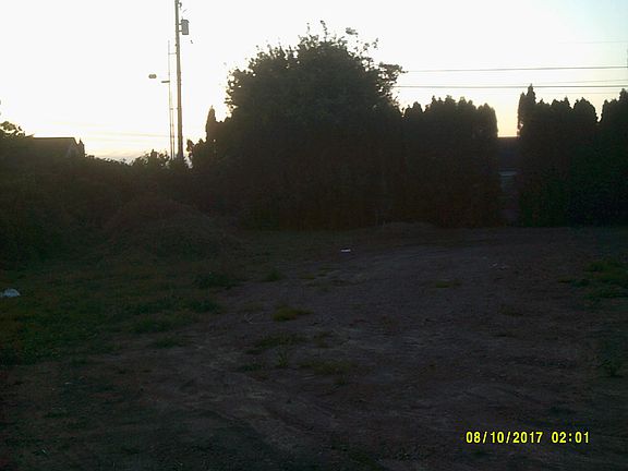 Entry to Lot Looking West II