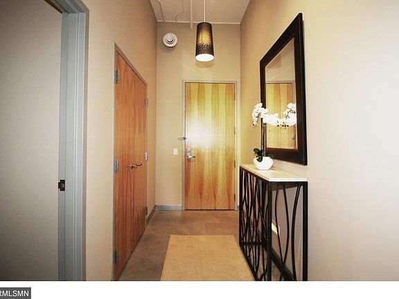 Beautiful Foyer has exposed 12.6' ceilings - the highest ones are on this floor other than the pent house condos