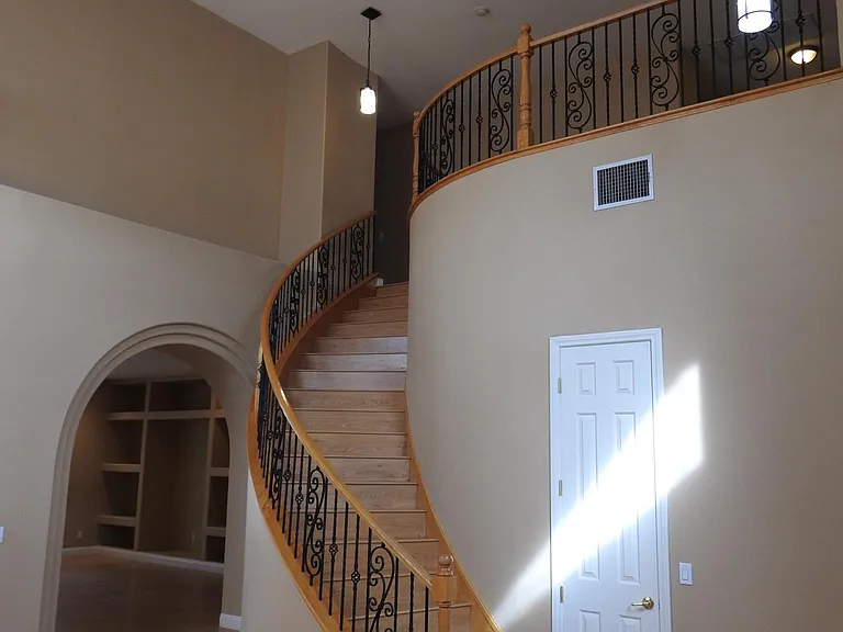 Entrance artistic wrought iron staircase