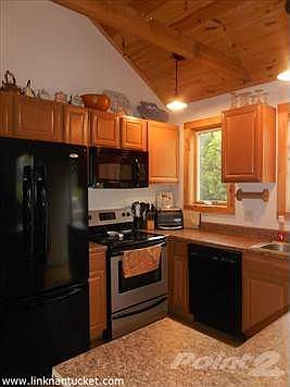 Kitchen with cathedral ceiling