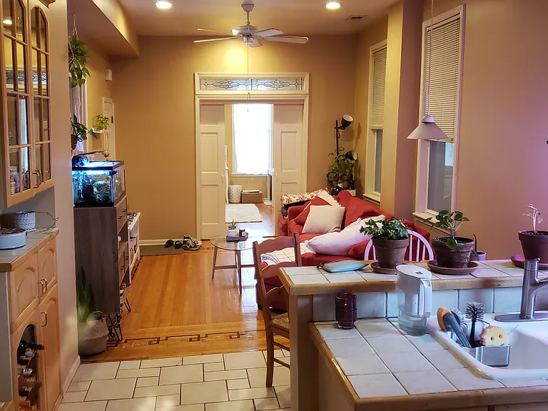 Kitchen, dining area, living room and bedroom 2 behind pocket doors