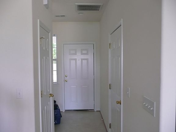 Front Entrance/Inside Door to Garage on Rt.