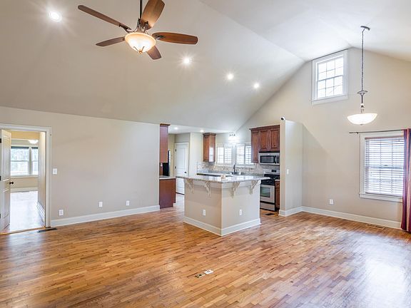 Enter the home into the very open great room, plenty of space for entertaining. Lots of natural light with cathedral ceiling!