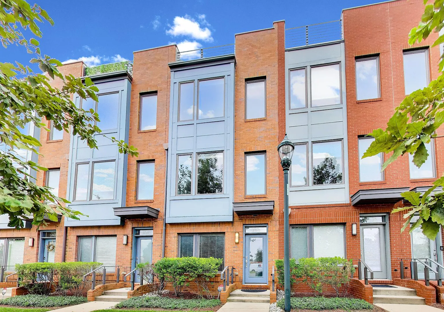 3 bed + 3.5 BA Beautiful "near new" TH w/ Roof Top Deck — Photo 1