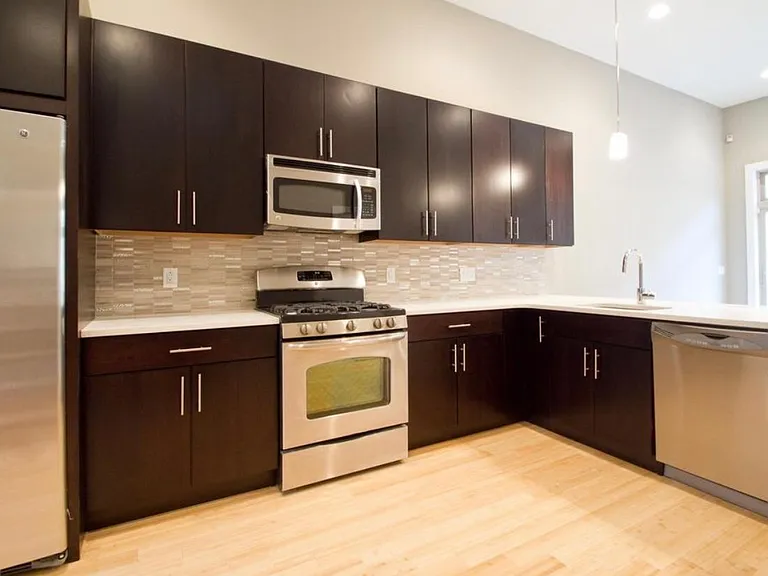 Kitchen with tall ceilings and lot of cabinet space