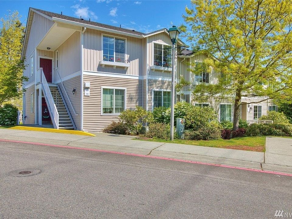 Front of condo, top floor on the left.